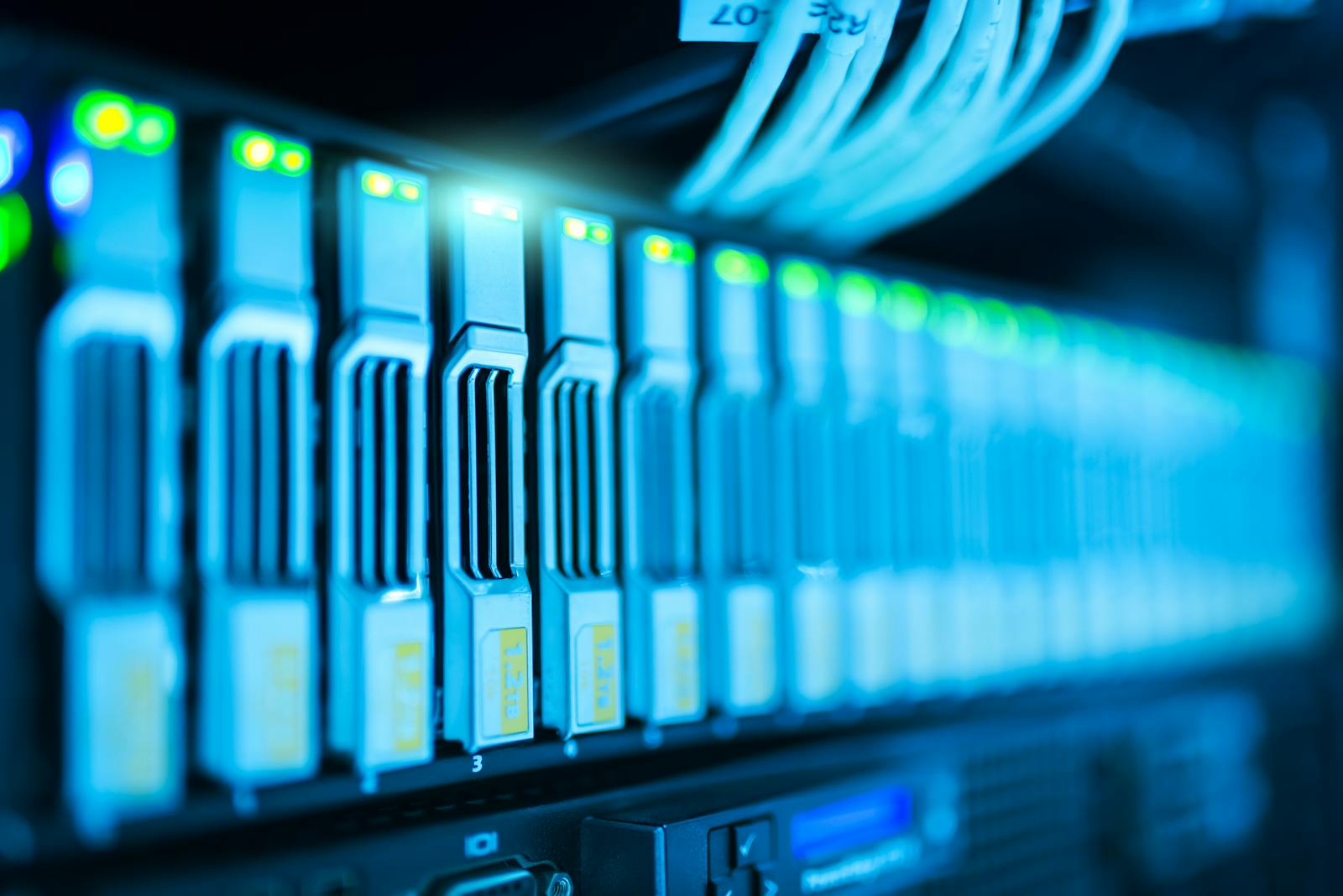 Server racks in a modern data centre — uptime SLAs at scale