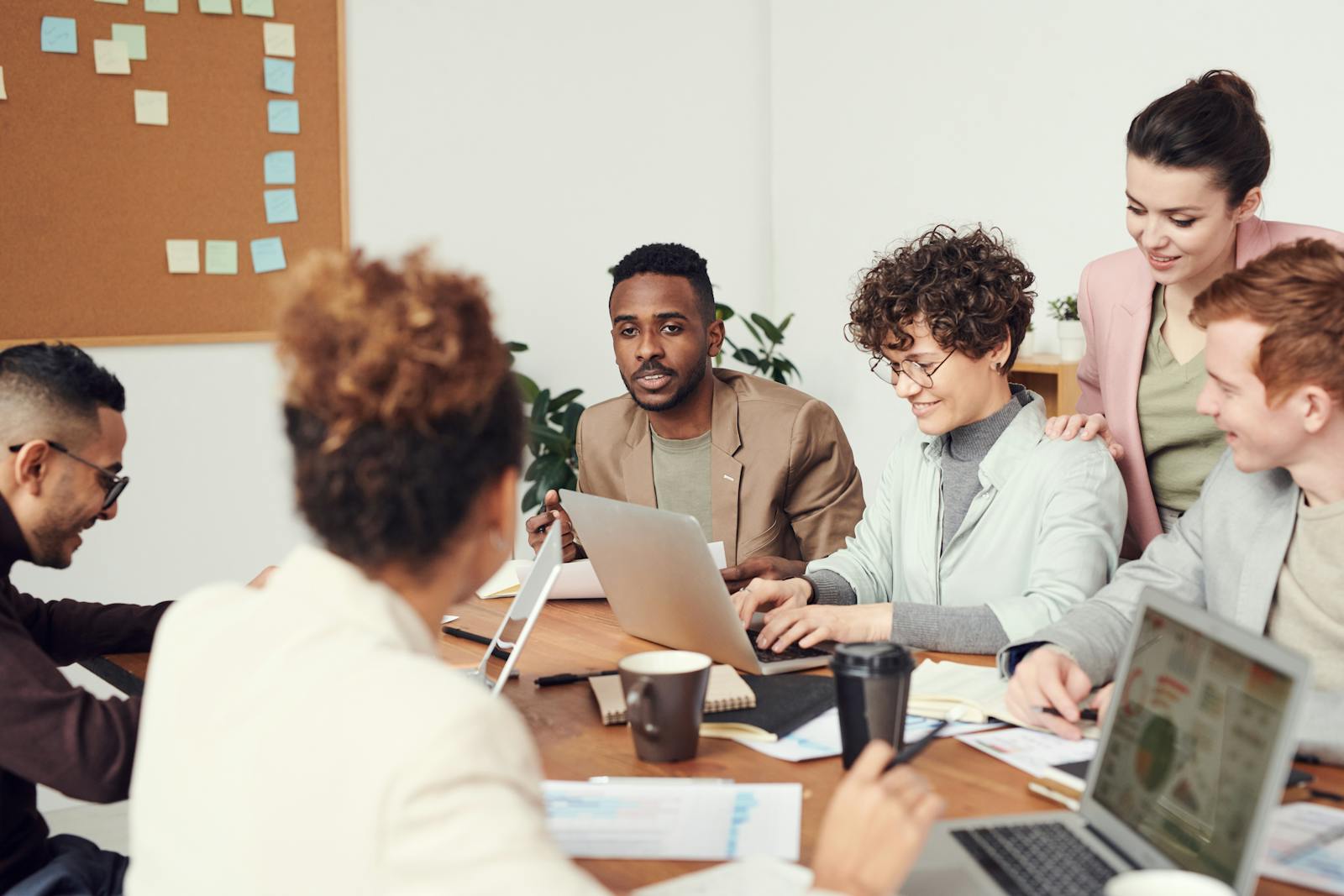 Team discussion around a shared document — questions and answers